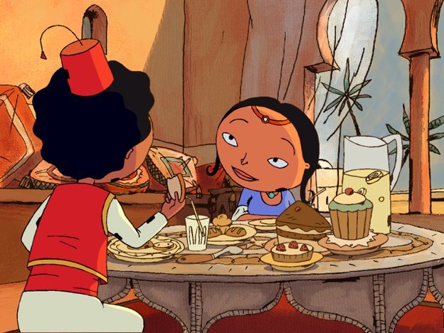 Un petit garçon et une petite fille autour d'une table sur laquelle on a dressé un petit-déjeuner